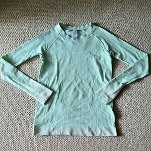 Light green Ivivva long sleeve shirt with thumb holes
